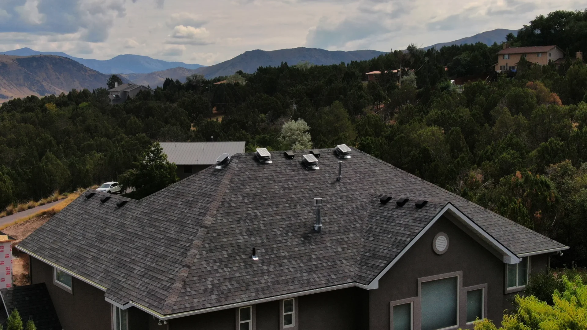 Pocatello-Residential-Roofing-with-Mountains-scaled